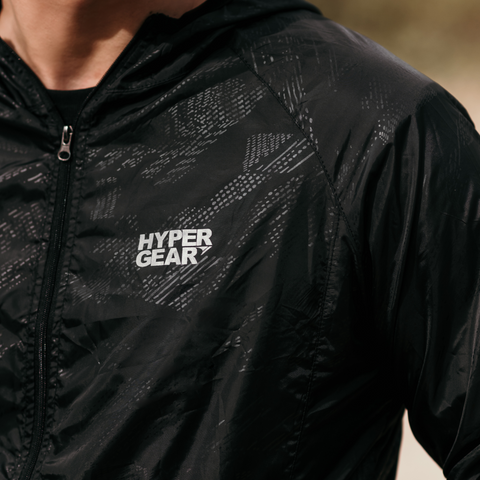Close-up of the reflective Hypergear logo on the windbreaker, designed for visibility in low-light conditions.